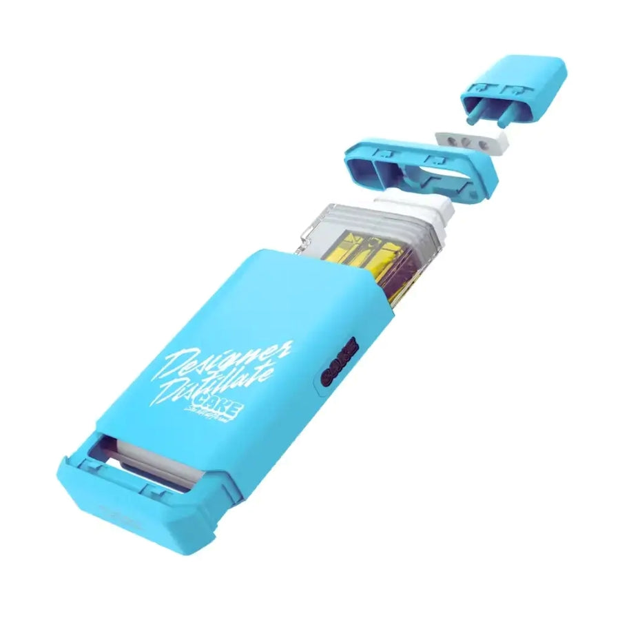 Close-up of Kiwi Burst Indica Designer Distillate from Cake, 1.25g packaging showing product details.